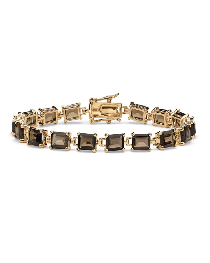 Front of a size 7.25 in 16 TCW Genuine Smoky Quartz Yellow Gold-Plated Tennis Bracelet 7.25" in Brown by PalmBeach Jewelry. | dia_product_style_image_id:297059